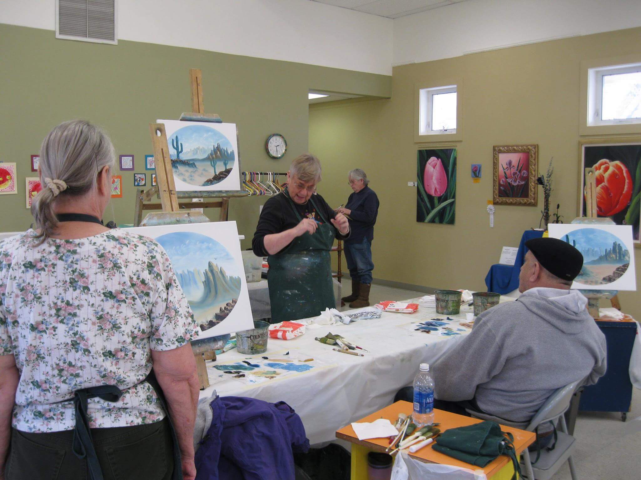 woodburn art center members during a painting class