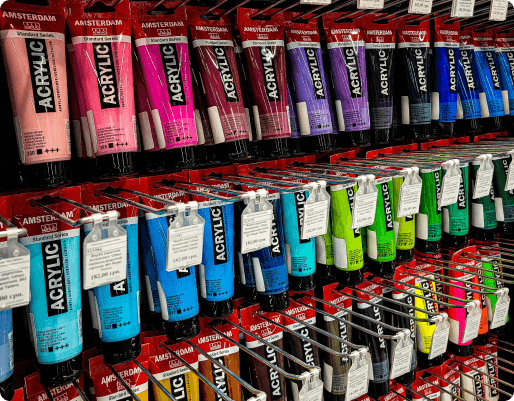 a stend of acrylic paint in an art store